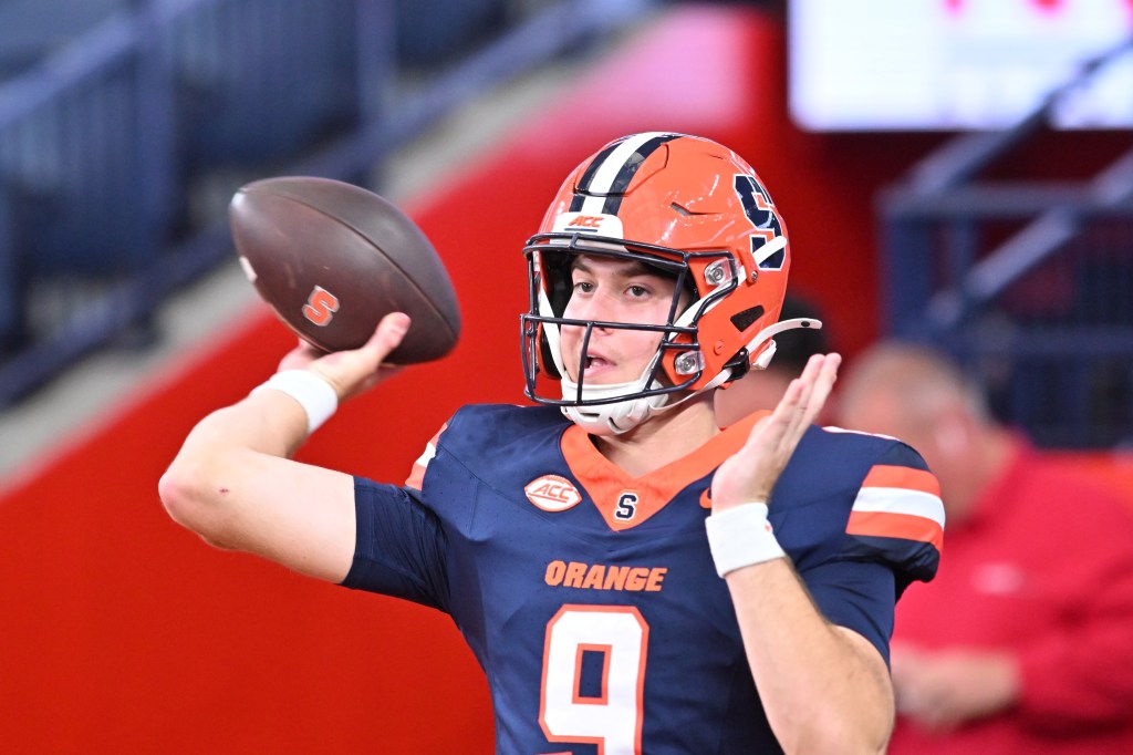 Syracuse quarterback Steve Angeli warms up before a game
