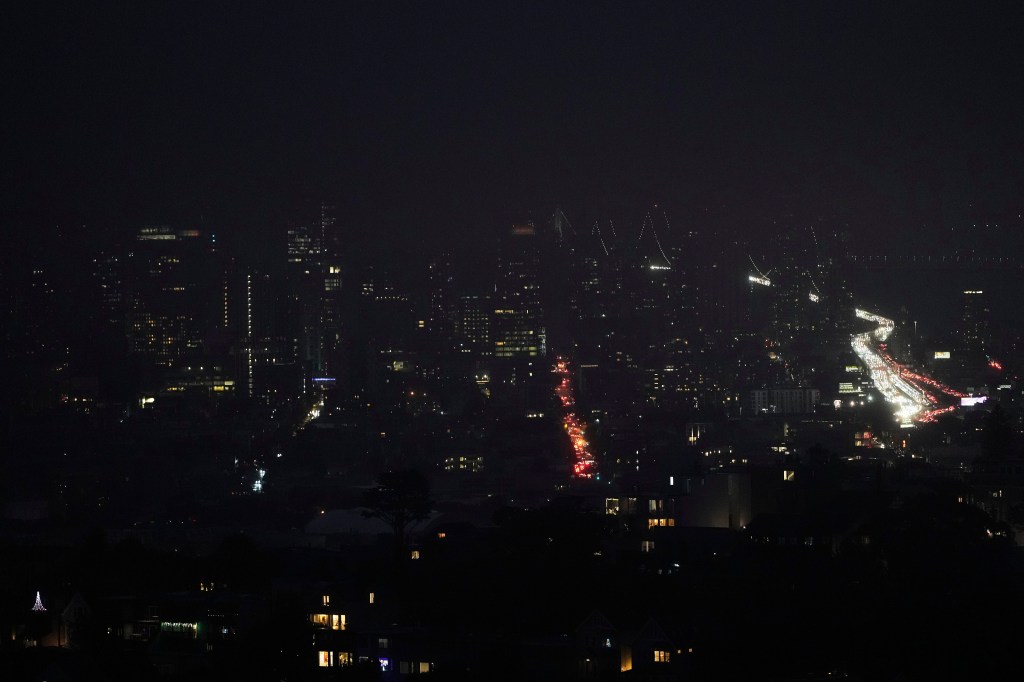 Darkened skyline and city lights as outage persisted