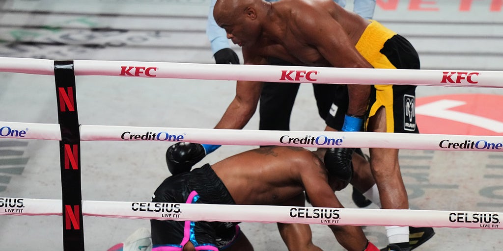 Anderson Silva stops Tyron Woodley in second round on Paul-Joshua card