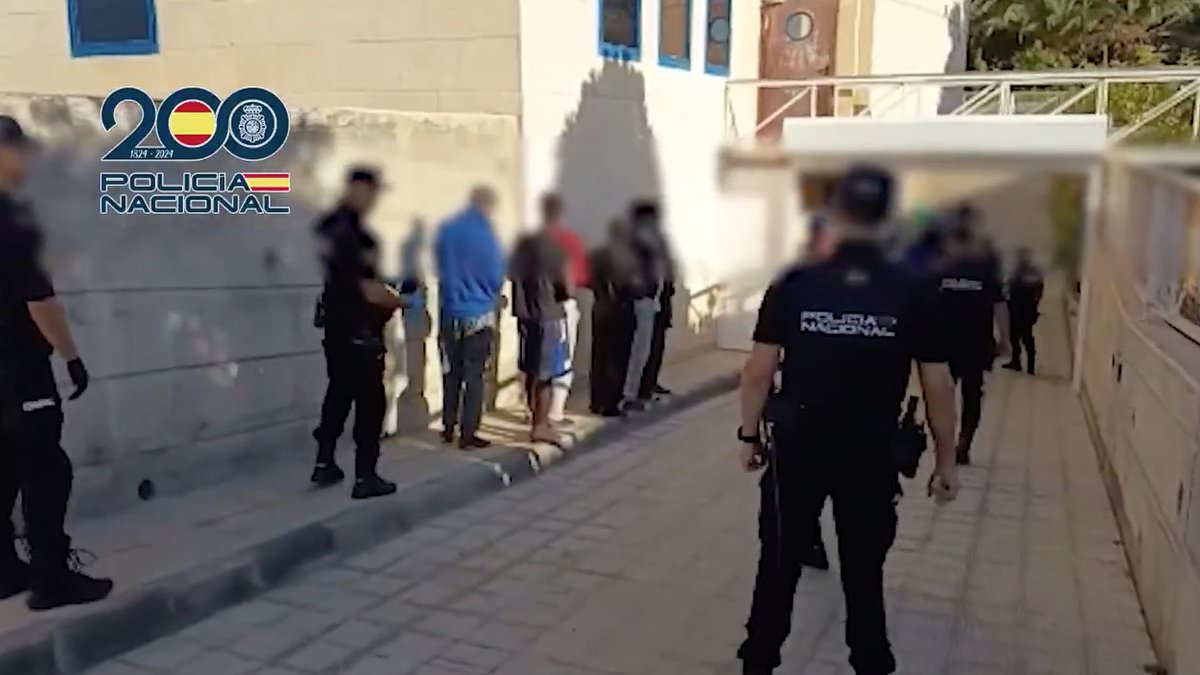 Spanish police arrest 19 after survivors say smugglers threw scores of migrants overboard during Atlantic crossing