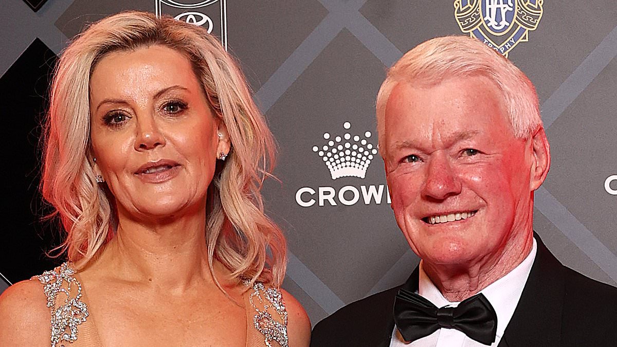Unidentified date steals attention at Brownlow as Des Tuddenham attends with sheer gown