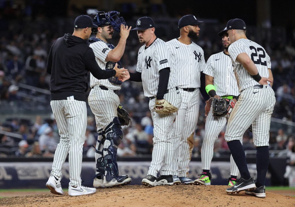 Cody Bellinger reacts after striking out in the first inning