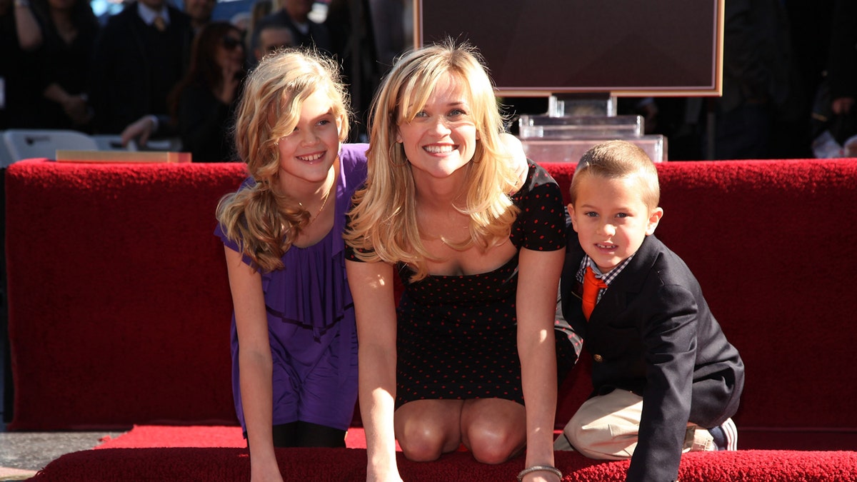 Reese Witherspoon says she regrets raising her kids in Los Angeles amid paparazzi during divorce
