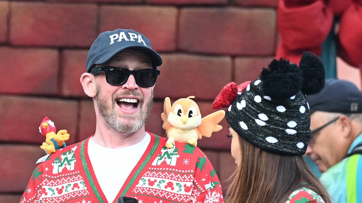 Macaulay Culkin and Brenda Song enjoy Disneyland day in matching Christmas jumpers with kids
