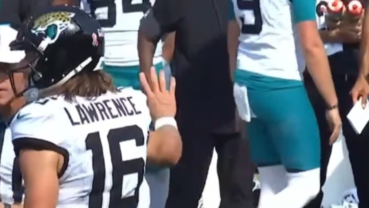 Trevor Lawrence waves off coach Liam Coen during Jaguars' loss to Bengals