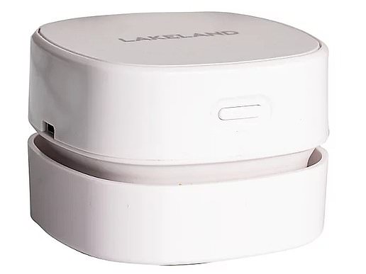 Mini vacuum and included USB‑C cable