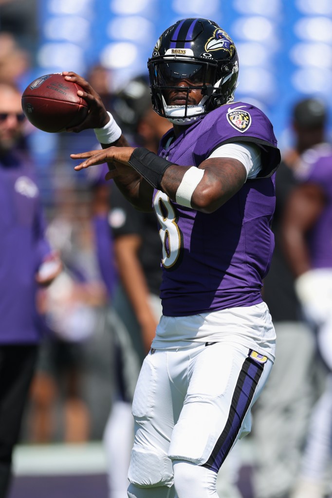 Lamar Jackson warms up