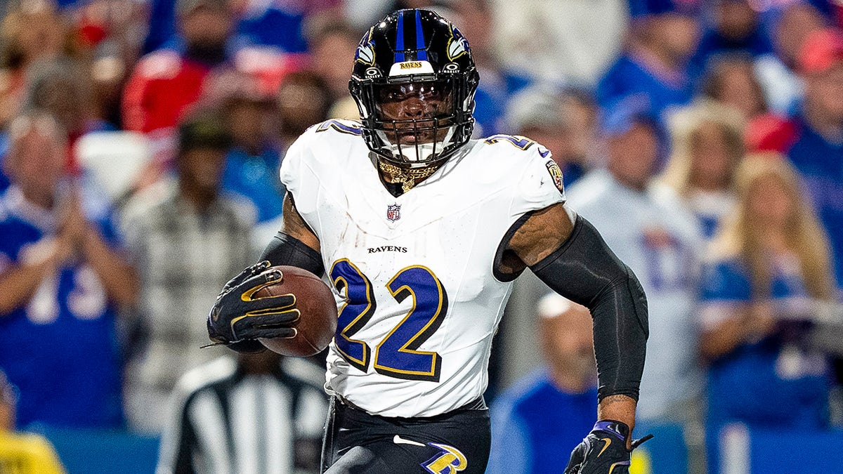 Derrick Henry runs with the ball for a touchdown during the game
