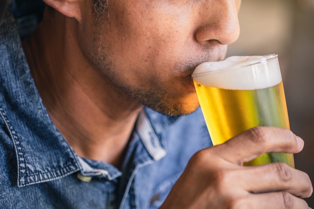 Friends toasting with beer