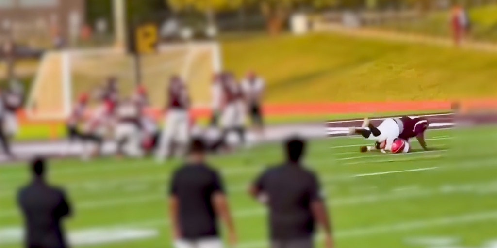 Michigan high school football player injured in body slam returns to field in wheelchair