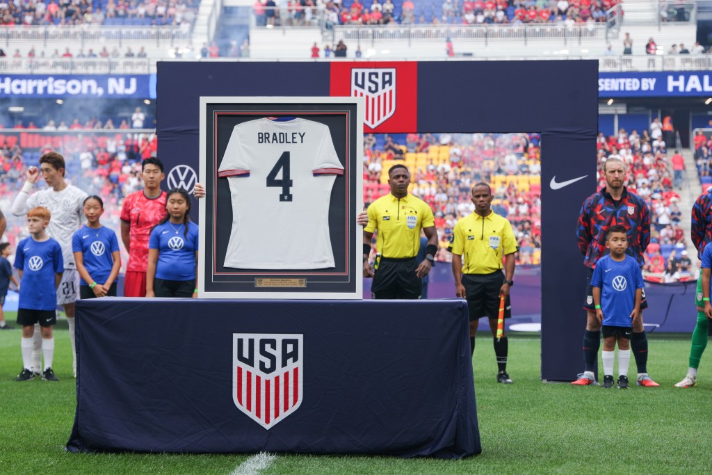 Bradley acknowledges the crowd during the pregame ceremony