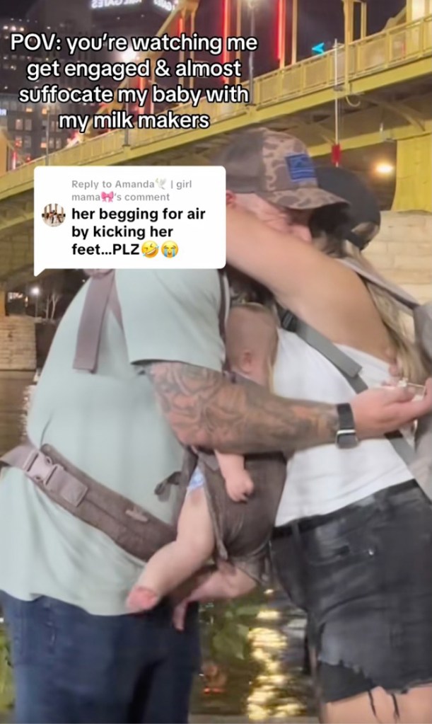 Close-up of distressed baby in carrier