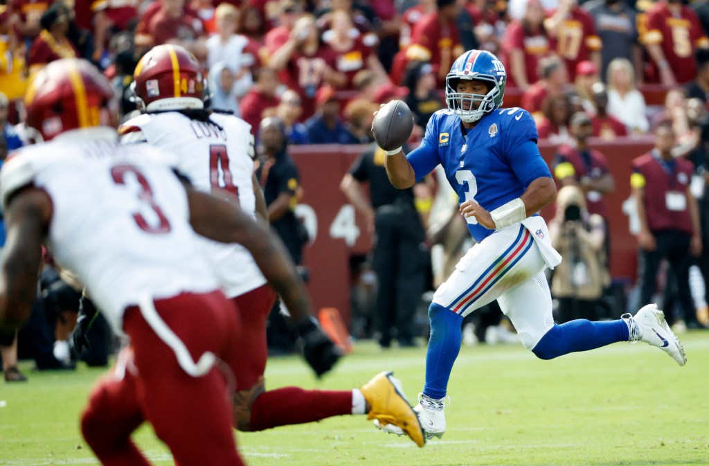 Russell Wilson in action against the Commanders