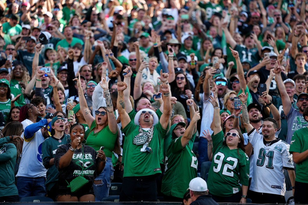 Philadelphia Eagles fans reacting at the Ryder Cup event