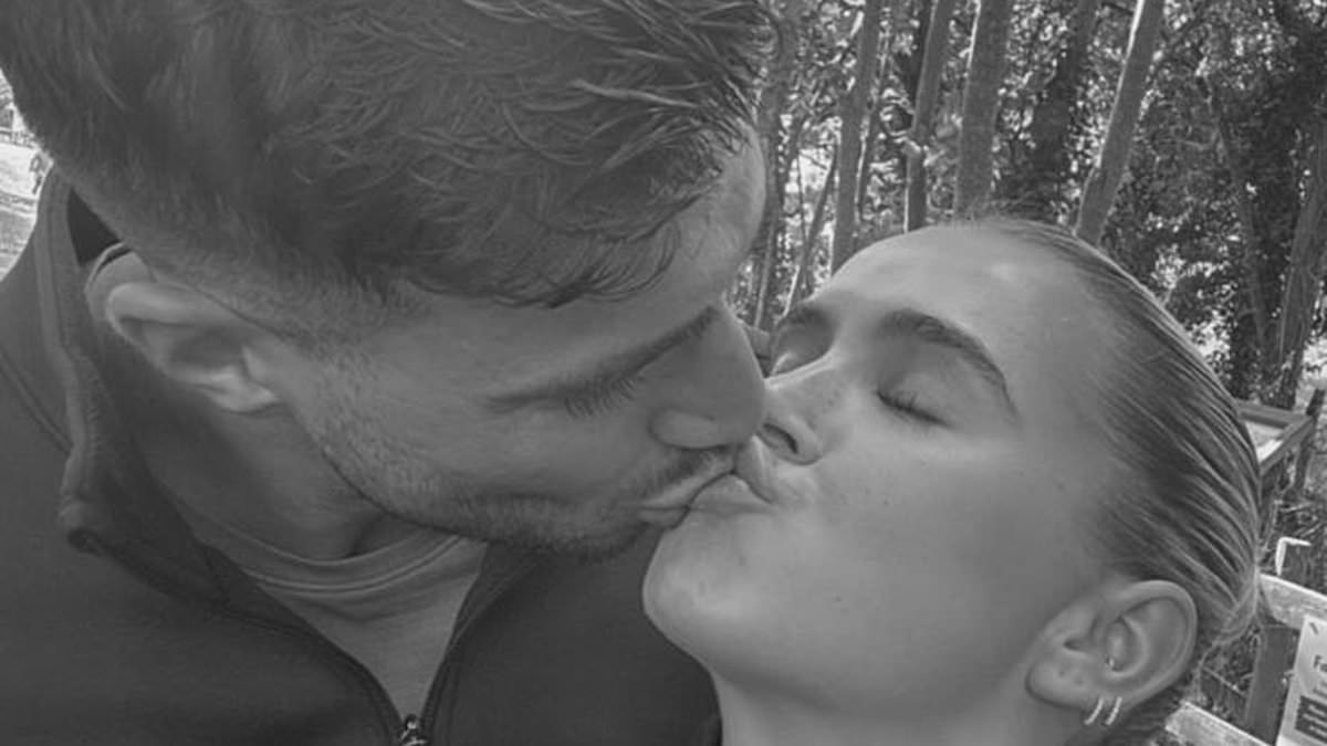 Molly-Mae Hague and Tommy Fury share kiss during family day out with daughter Bambi