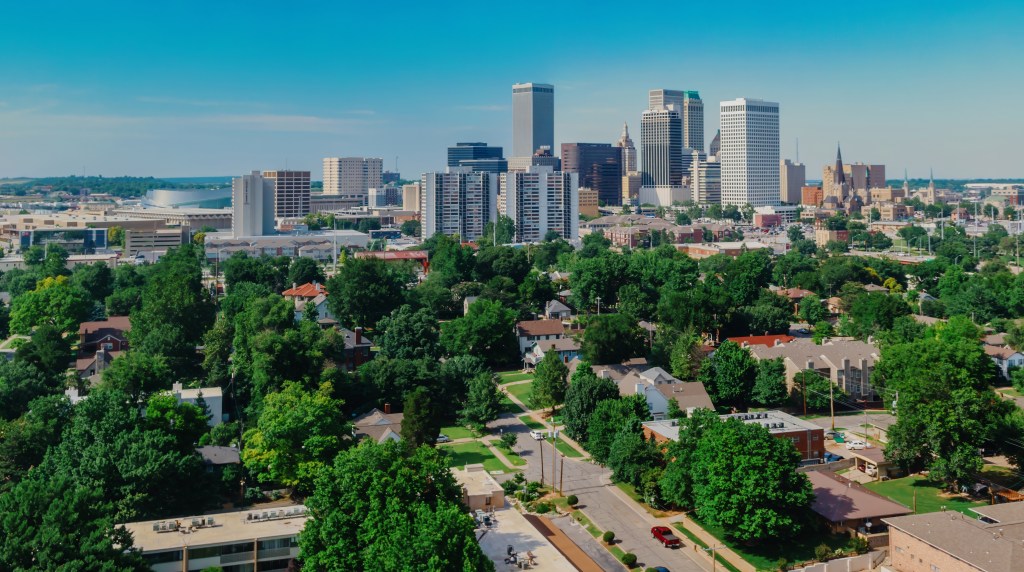 Residential houses in Tulsa with downtown skyline
