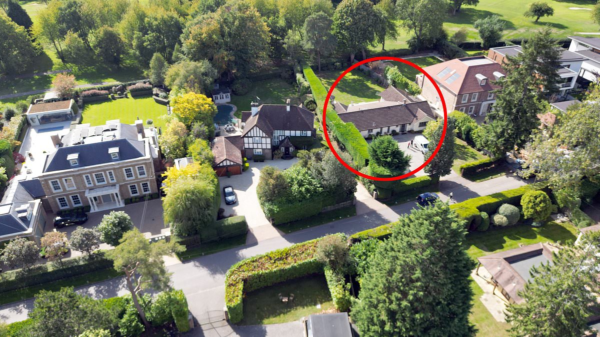 Lone bungalow sits between two mega-mansions on Surrey’s millionaire’s row