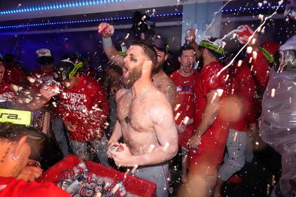 Bryce Harper celebrates on the field
