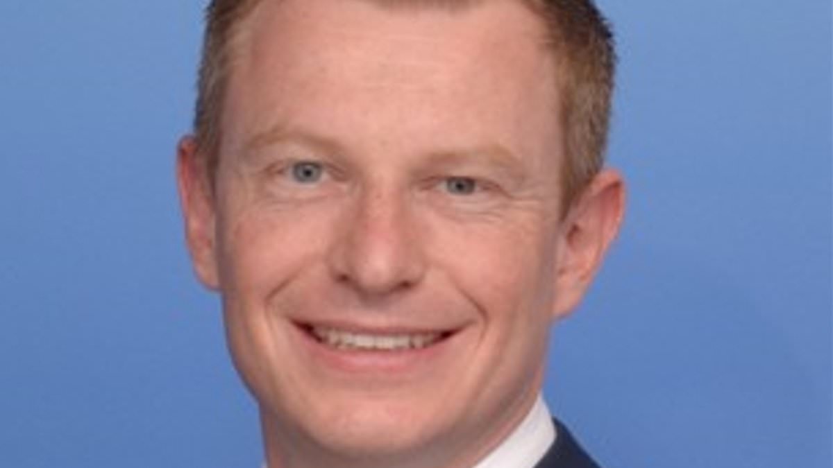 Senior government adviser charged with rape after previous domestic-violence allegations in Australia