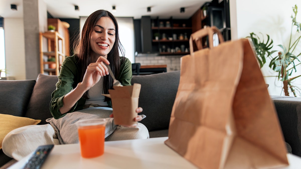 Close-up of packaged ultra-processed food products on a store shelf