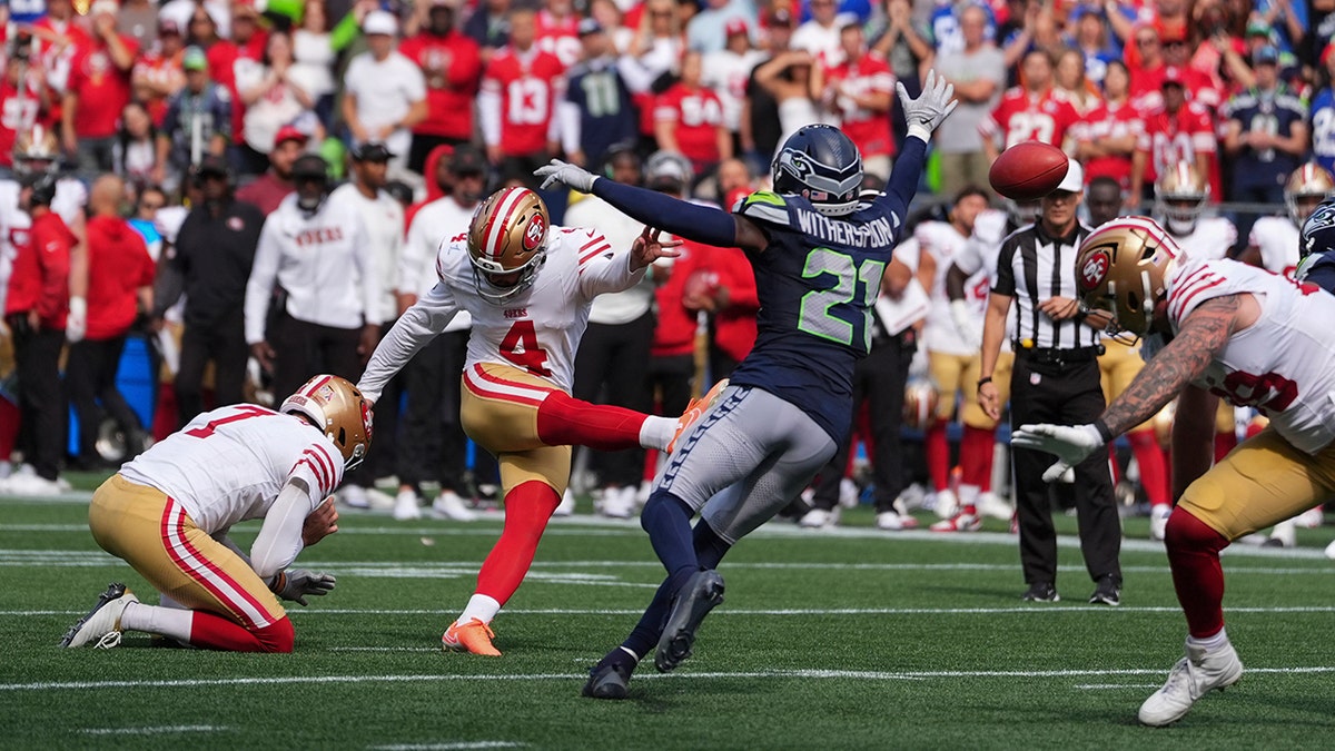Moody with teammates after a field goal