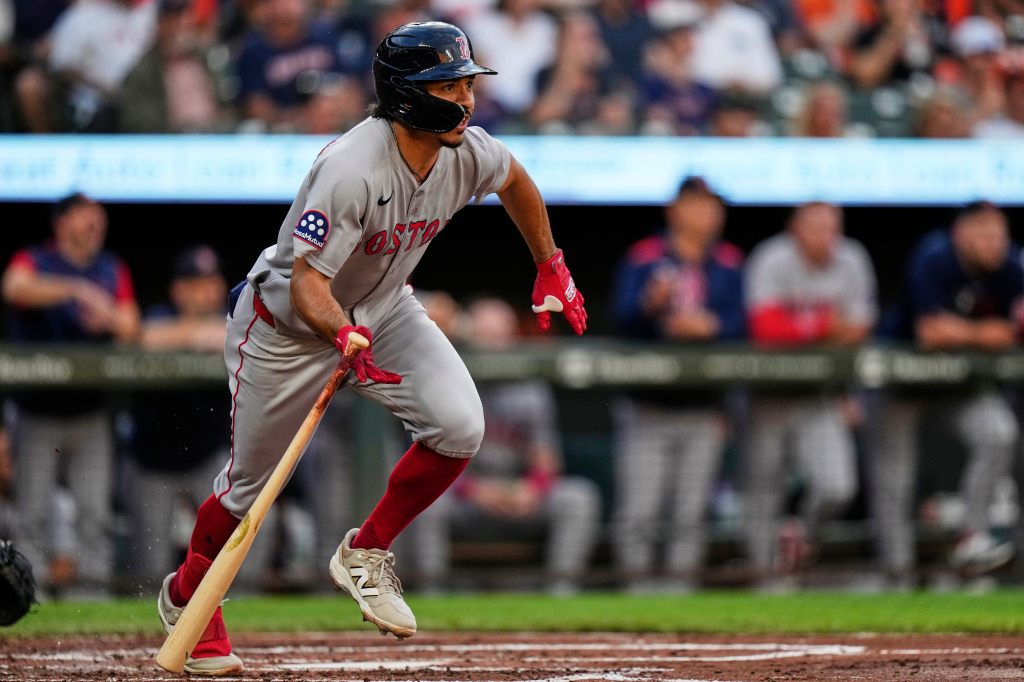 David Hamilton watches a pitch during a game