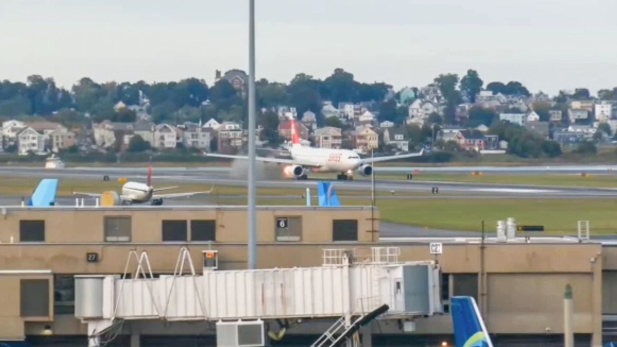 Swiss International Air Lines flight aborts Boston takeoff after engine flames; no injuries