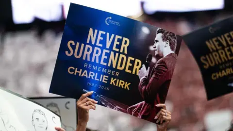 Kirk memorial blends religious revival with MAGA politics, signaling future of the movement
