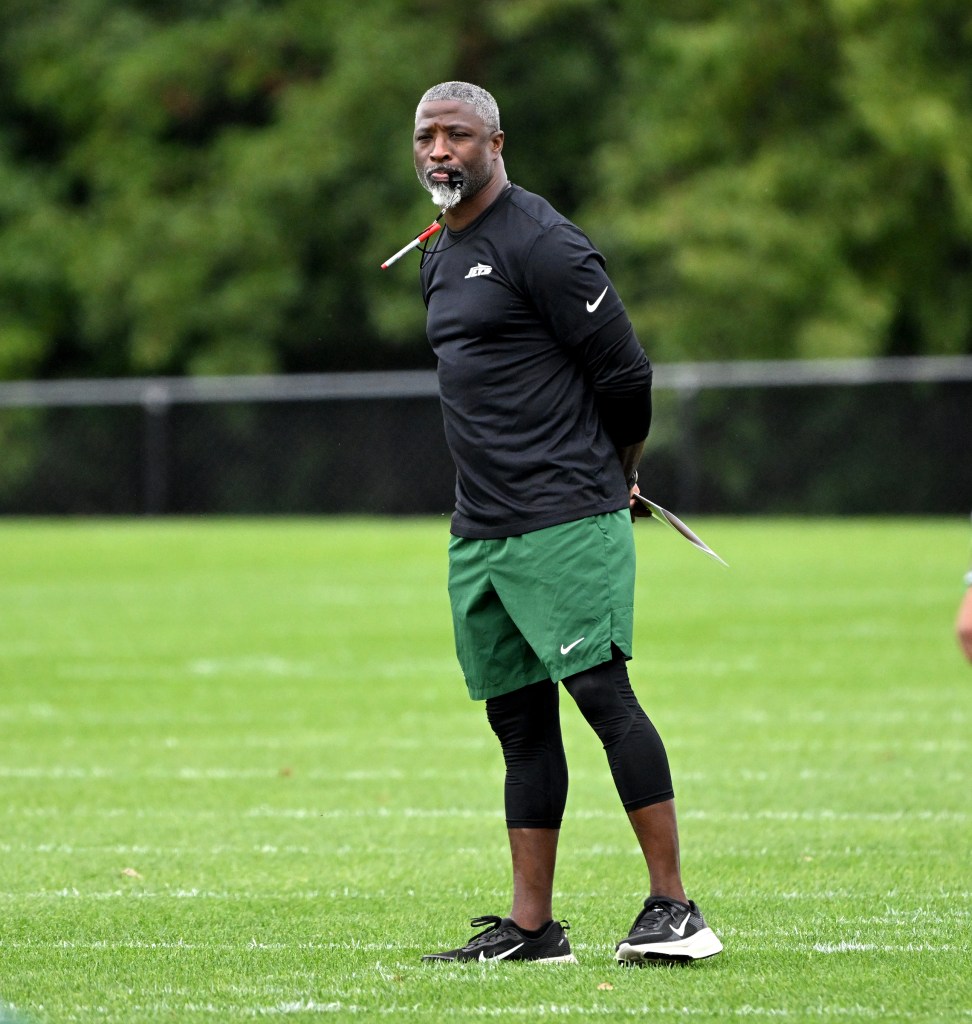 Jets coach Aaron Glenn looks on during practice