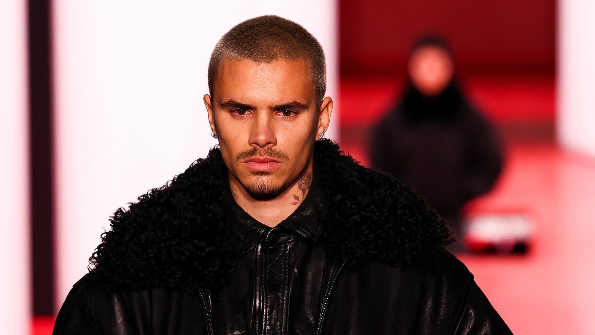 Romeo Beckham debuts on London Fashion Week runway, hailed as 'perfect combo' of his parents