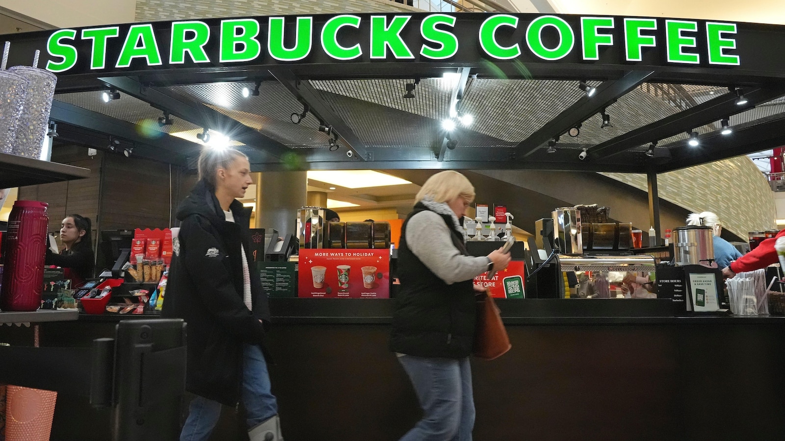 Starbucks to close stores, lay off 900 workers as part of turnaround plan