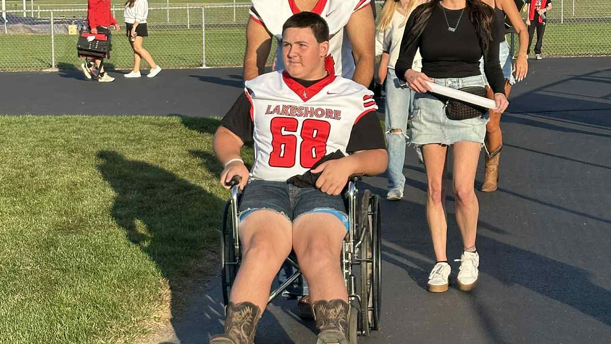 Michigan high school football player returns to the field in a wheelchair after on-field attack
