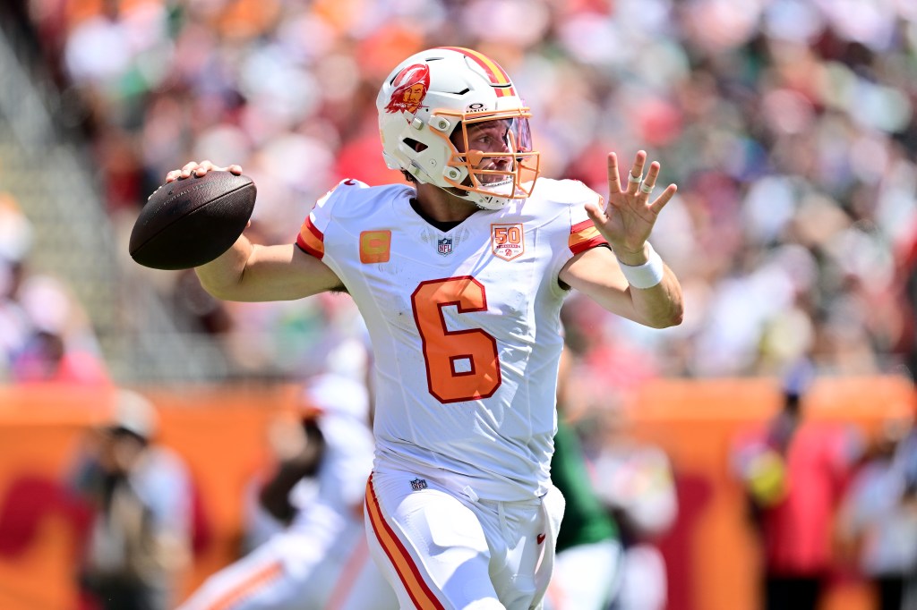 Jamel Dean intercepts and returns for a touchdown