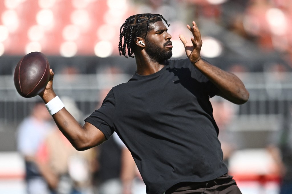 Shedeur Sanders warming up