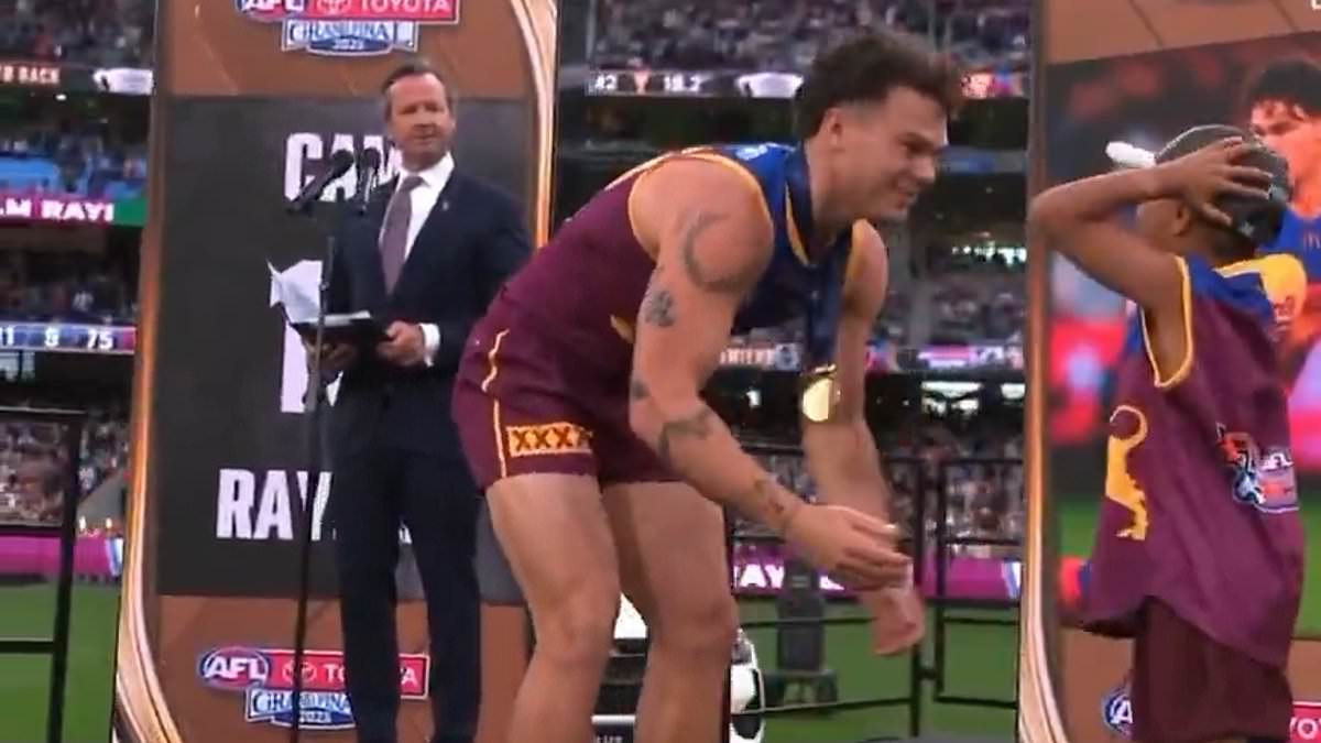 Brisbane Lions defend AFL crown as Auskick moment sparks conspiracy chatter