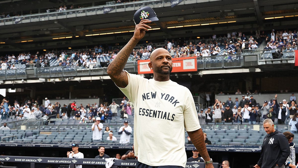 CC Sabathia tips his hat during a ceremony honoring his Hall of Fame induction prior to a game at Yankee Stadium