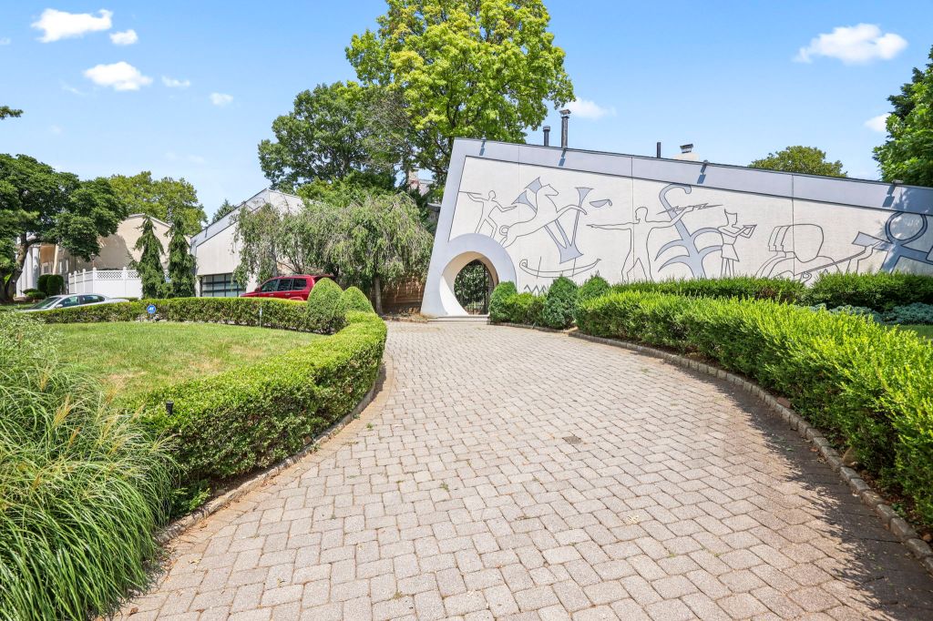 Interior view showing the concrete form and murals