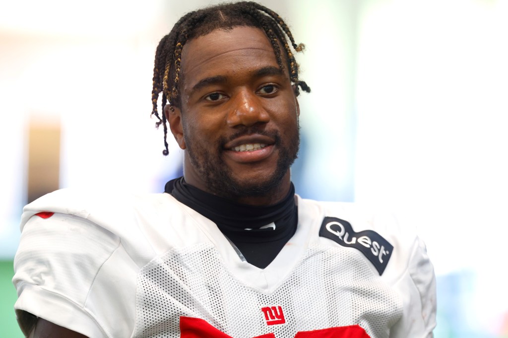 New York Giants linebacker Bobby Okereke answers questions from reporters during practice