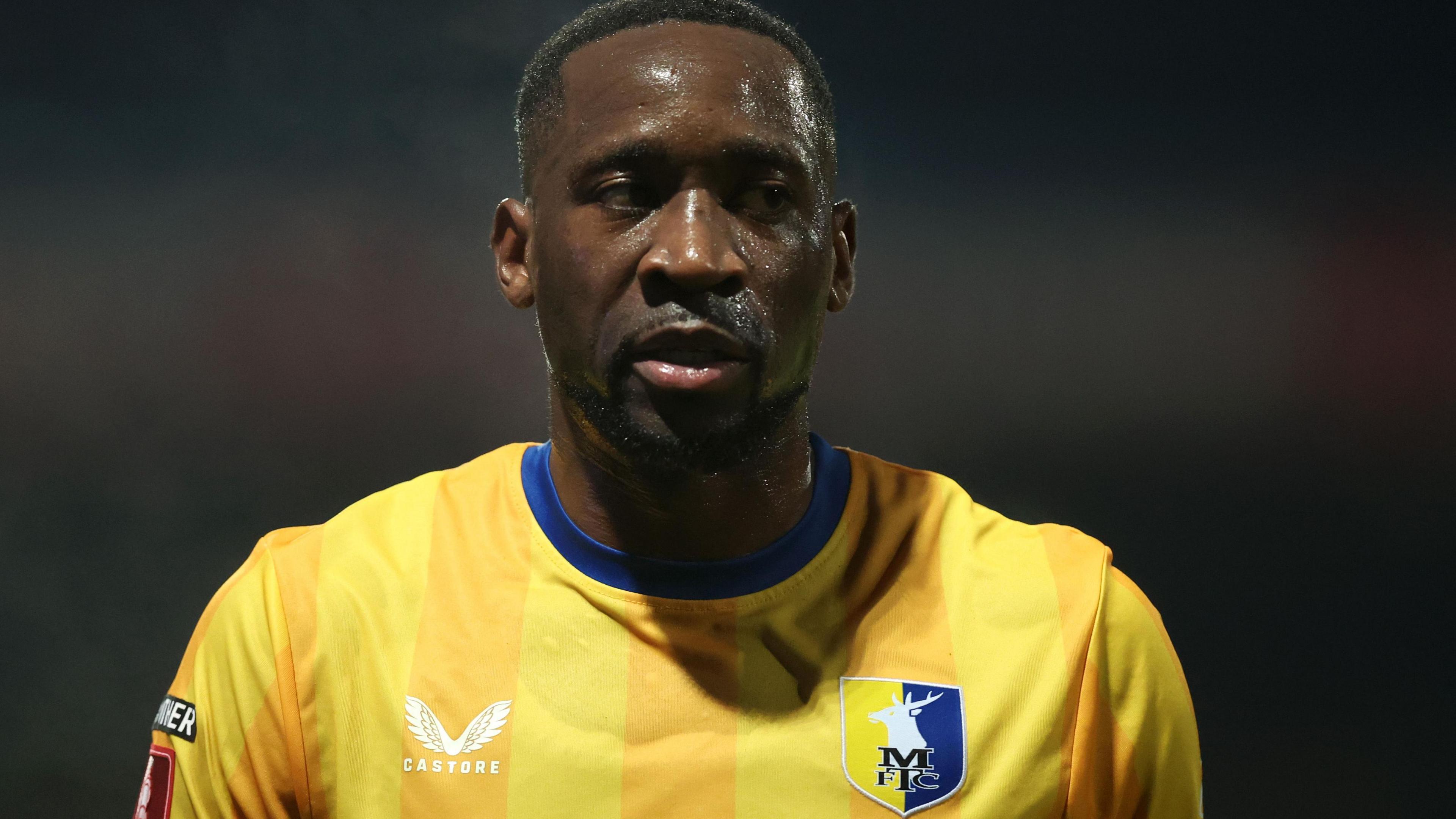 Jailed Lucas Akins named on Mansfield Town squad list