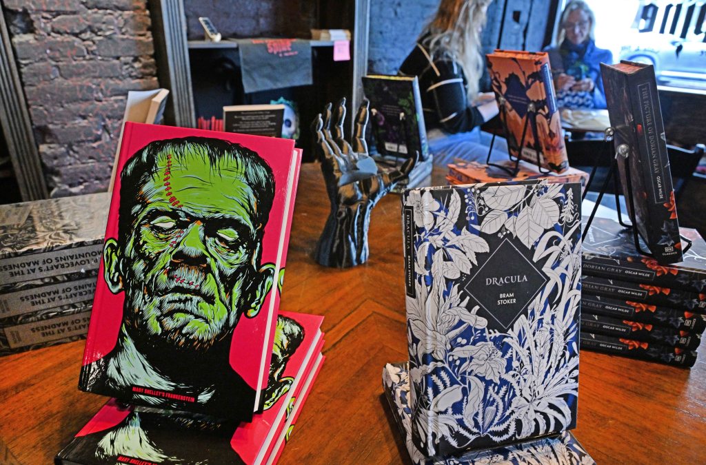 Reader enjoying a book at The Twisted Spine