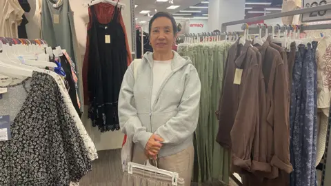 Shoppers amid store displays