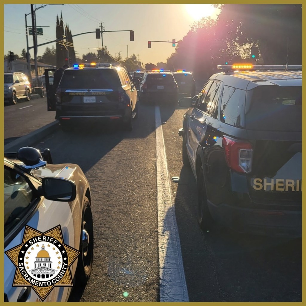 Police activity near a patrol car