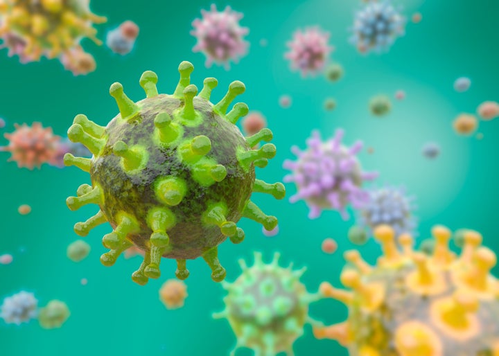 A healthcare worker prepares a swab for testing