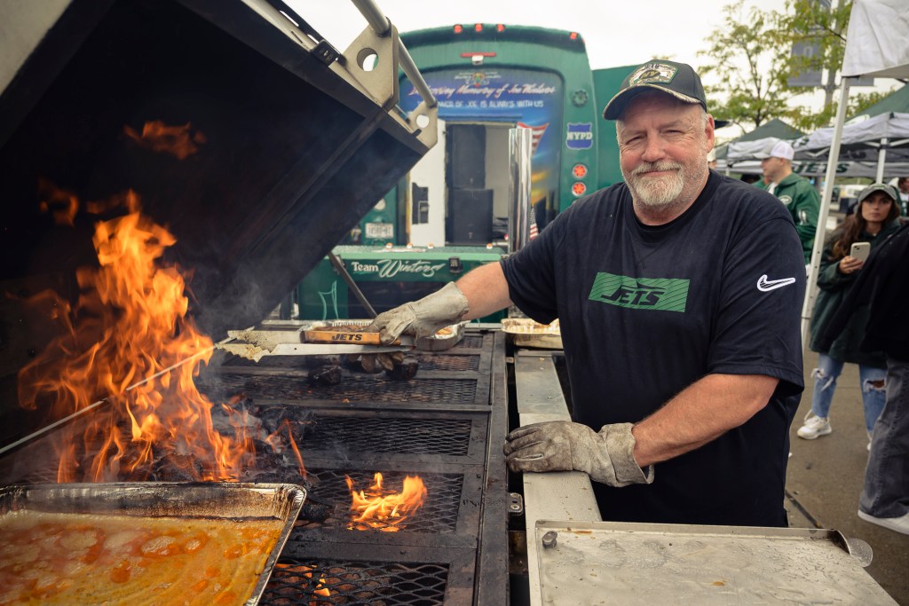 Winters grilling steaks for Jets fans