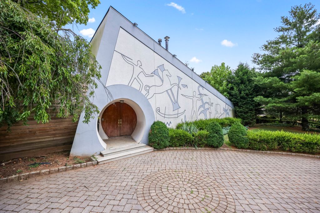 Aerial view of the home amid traditional properties on Todt Hill
