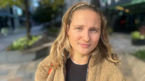 Charity worker engages with a rough sleeper