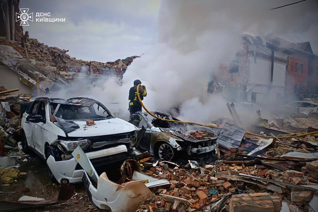 Ukrainian rescuer works site
