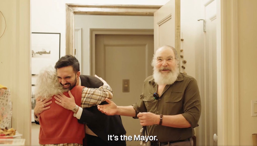 Patinkin, Kathryn Grody and Mamdani in the Hanukkah setup