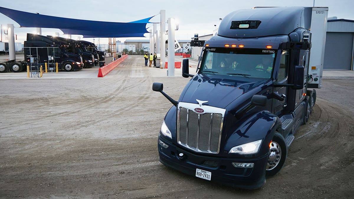 Former Texas governor urges US to accelerate autonomous trucking to address driver shortage and global competition