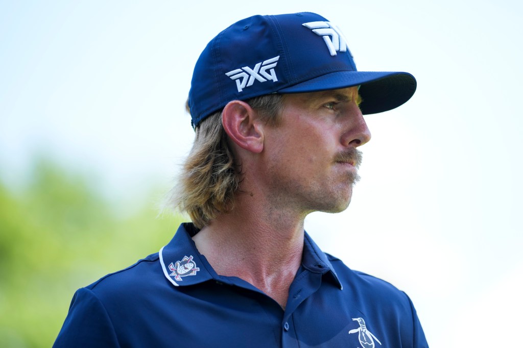 Jake Knapp walks the third green